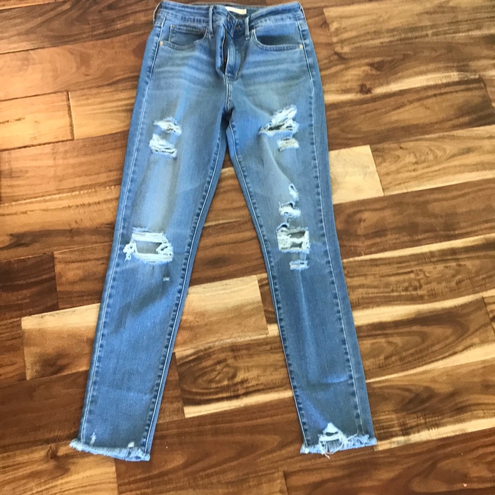 Ankle distressed jeans. New without tags.